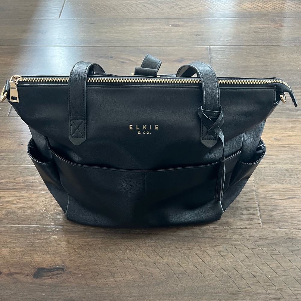 Black Elkie & Co diaper bag, leopard interior